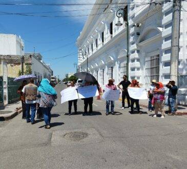 Habitantes de la invasión Mirabal o Santísima Trinidad