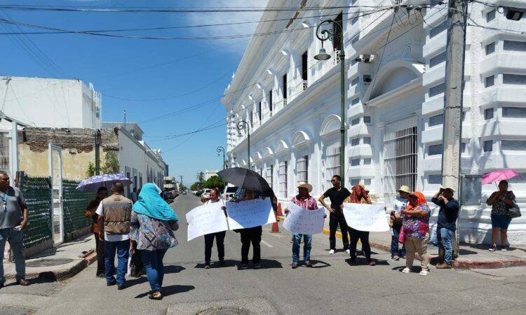 Habitantes de la invasión Mirabal o Santísima Trinidad